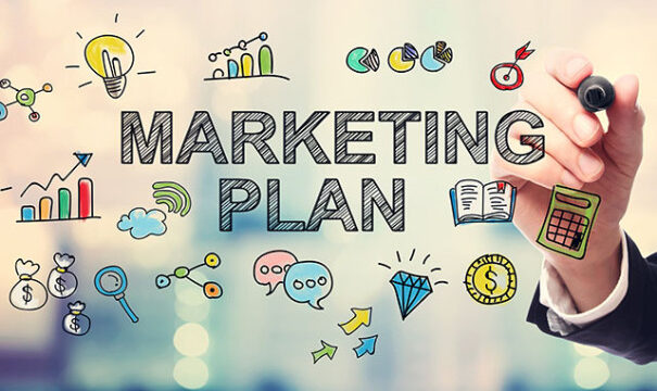 Businessman drawing Marketing Plan concept